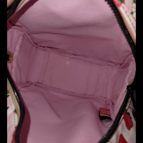 Previously loved Strawberry Shortcake mini 11” backpack from Bioworld Hot Topic